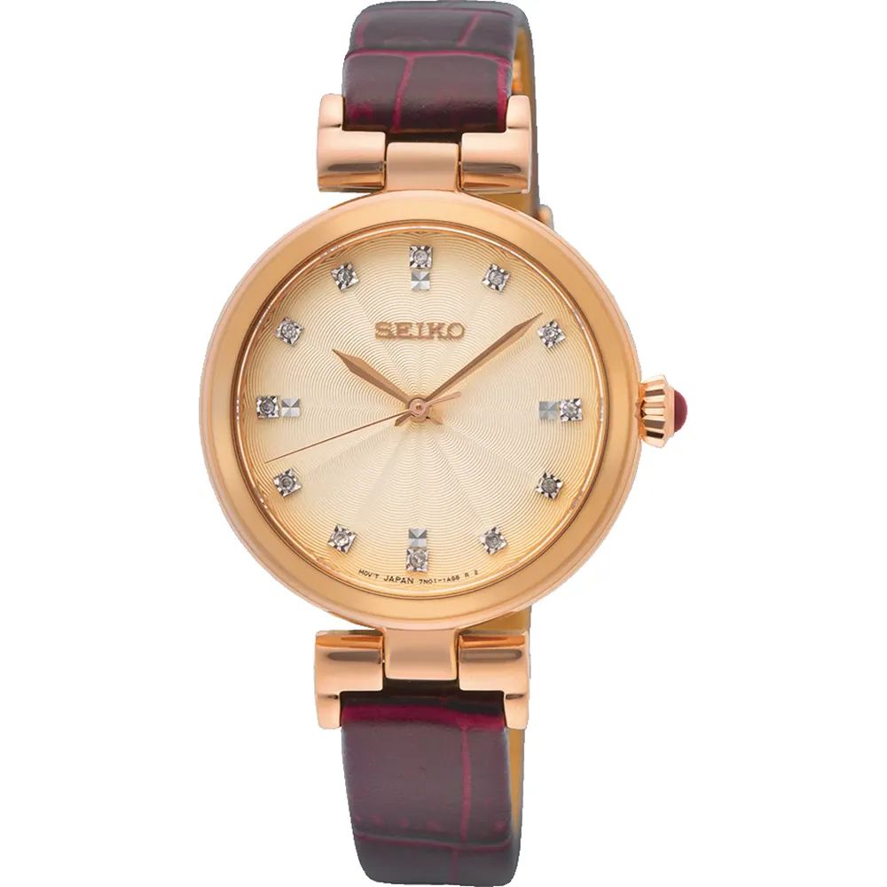 Seiko SRZ548P1 watch for women with a golden dial and leather strap.